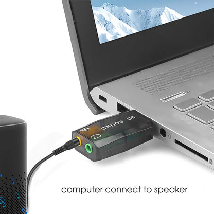 Black 3d sound channel usb independent audio adapter with green and yellow ports connected to a laptop to replace pci notebook sound card