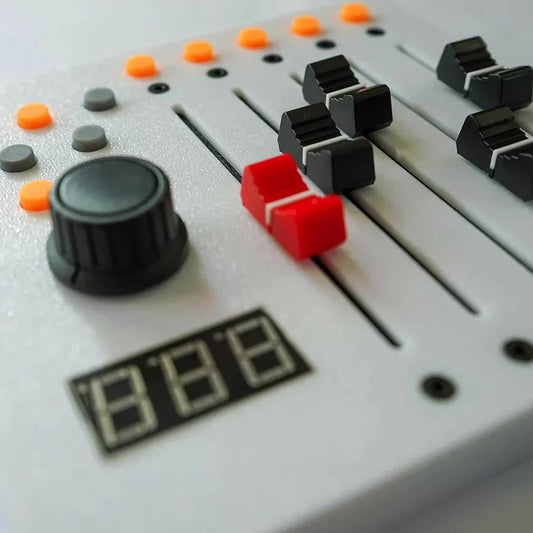 White 5-channel long fader midi controller with black knobs orange buttons red slider for live streaming software and type beat music