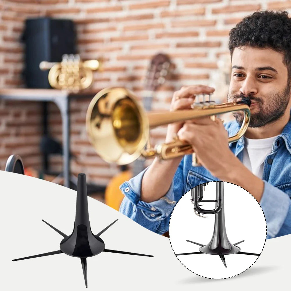 Black plastic foldable trumpet stand with five angled legs and central cone base portable placement rack for woodwind use
