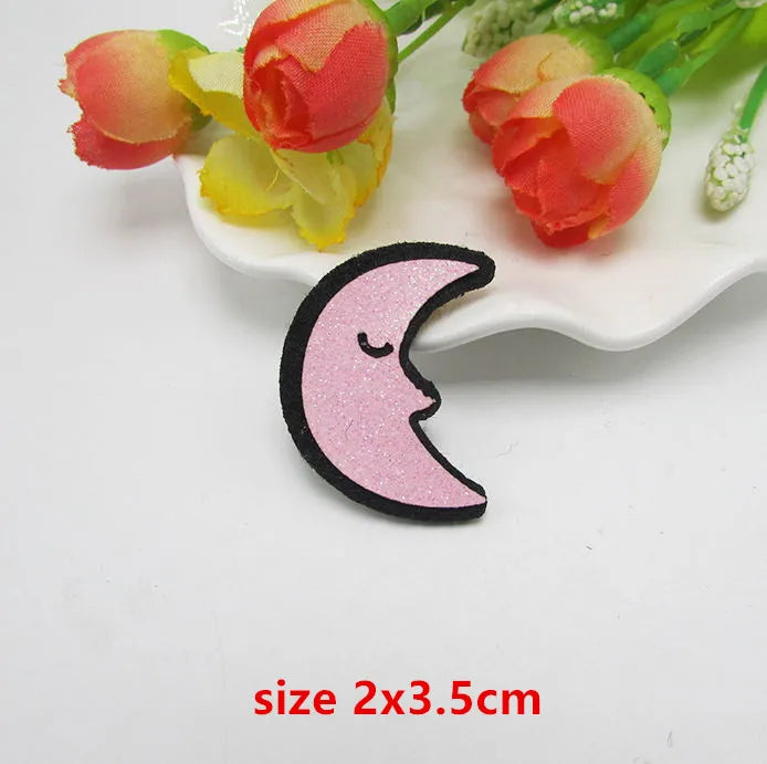 Pink glittery crescent moon sparkle patch padded felt applique decoration diy with black outline and closed eyes