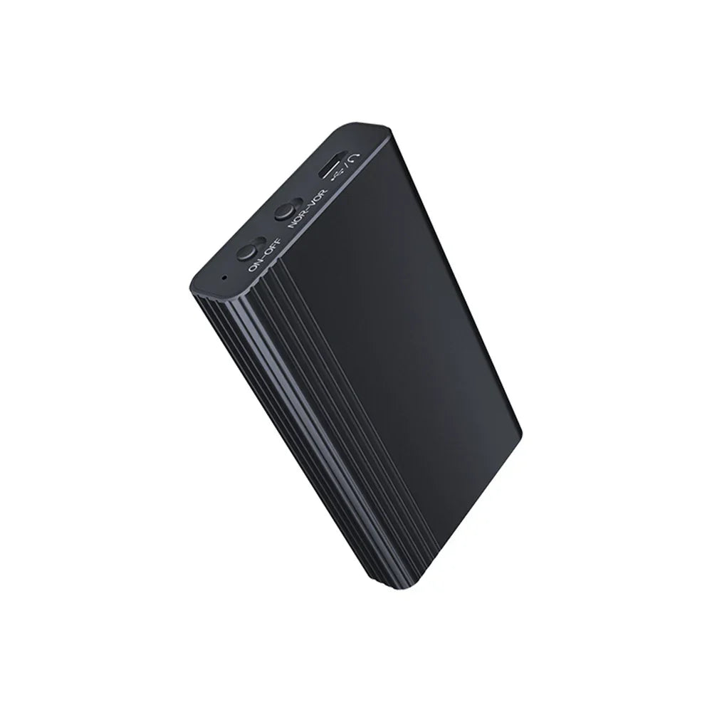 Black rectangular small digital audio voice activated recorder with textured ribbed side and usb ports on top edge magnet small digital device