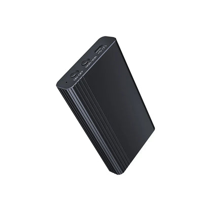 Black rectangular small digital audio voice activated recorder with textured ribbed side and usb ports on top edge magnet small digital device