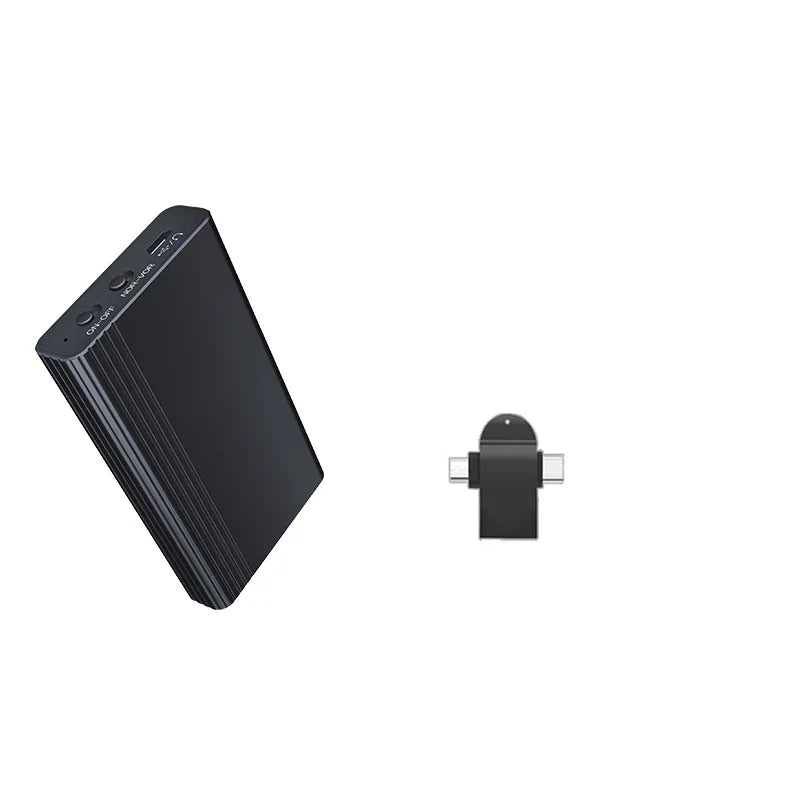 Black rectangular portable power bank with usb ports and ridged texture paired with magnet small digital voice activated recorder adapter