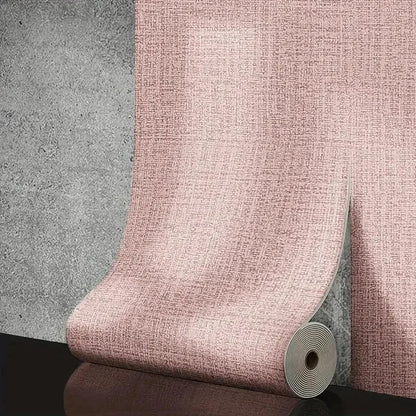 A roll of 50cm self-adhesive foam wall panel in textured pink pvc with a woven pattern for living room decor
