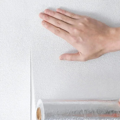 A roll of clear textured self-adhesive foam wall panel with embossed pvc pattern ideal for living room decor