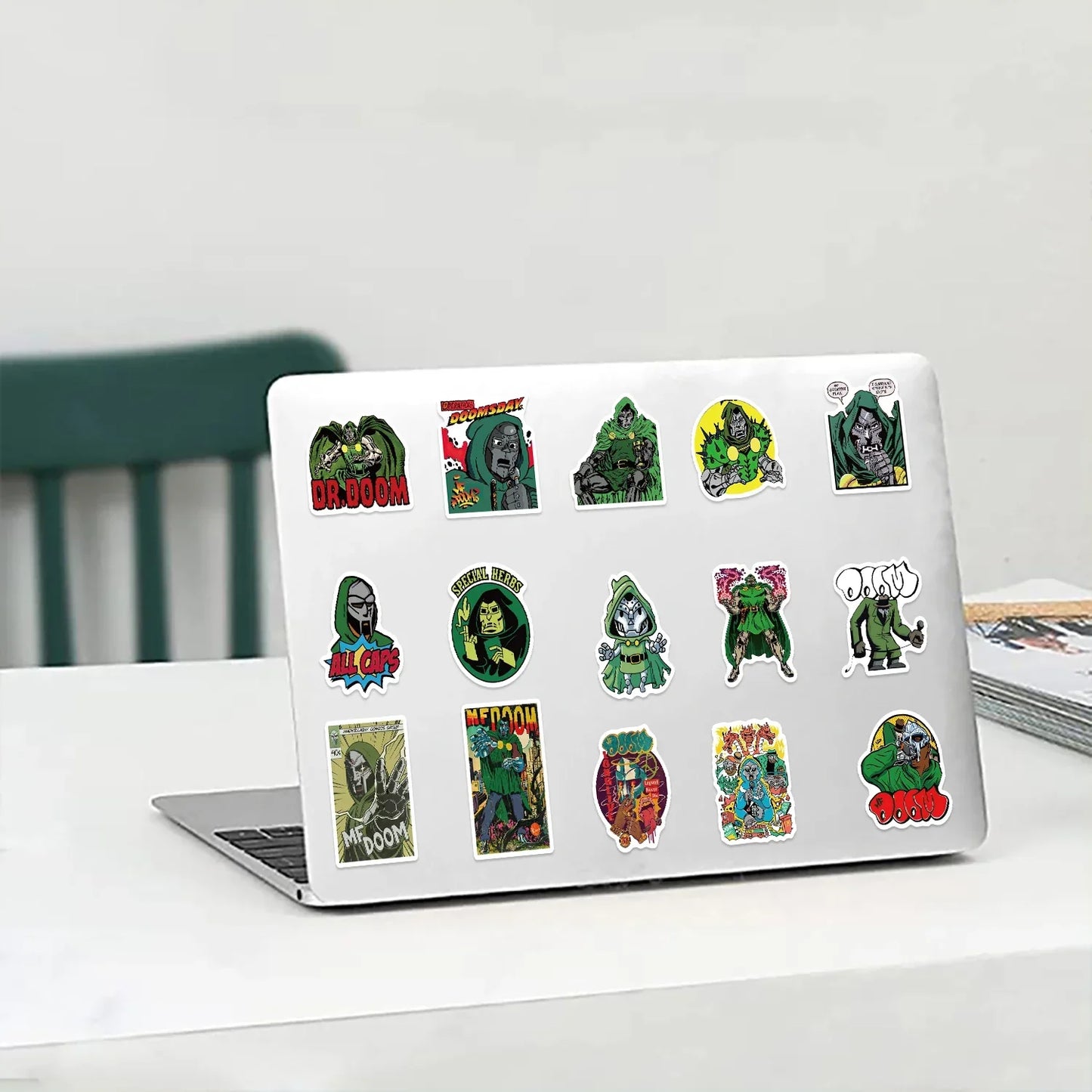Silver laptop decorated with colorful green rapper mf doom graffiti diy skateboard luggage laptop guitar stickers