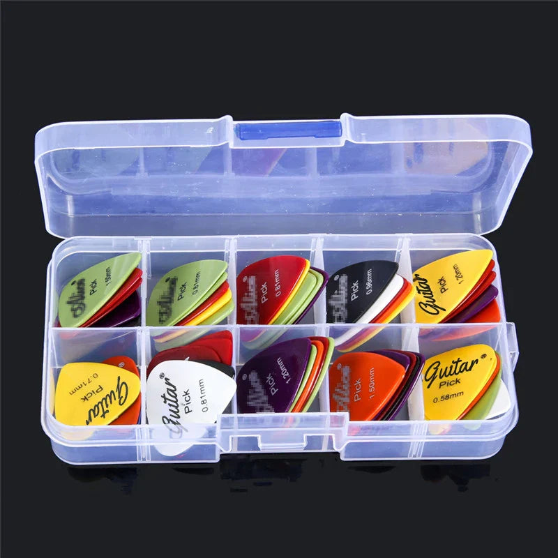A clear plastic organizer box with colorful electric guitar picks in multiple sizes including 50mm thickness guitar picks