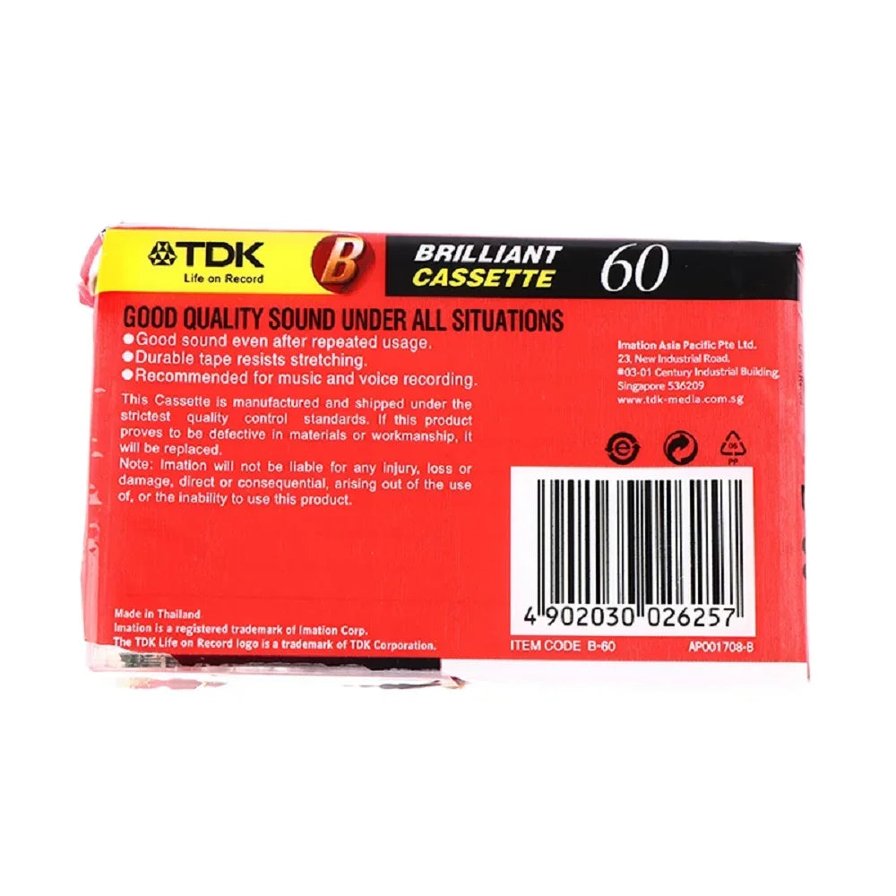 Red and black tdk brilliant cassette 60 packaging with yellow accents for high qulity standard magnetic audio tape recording