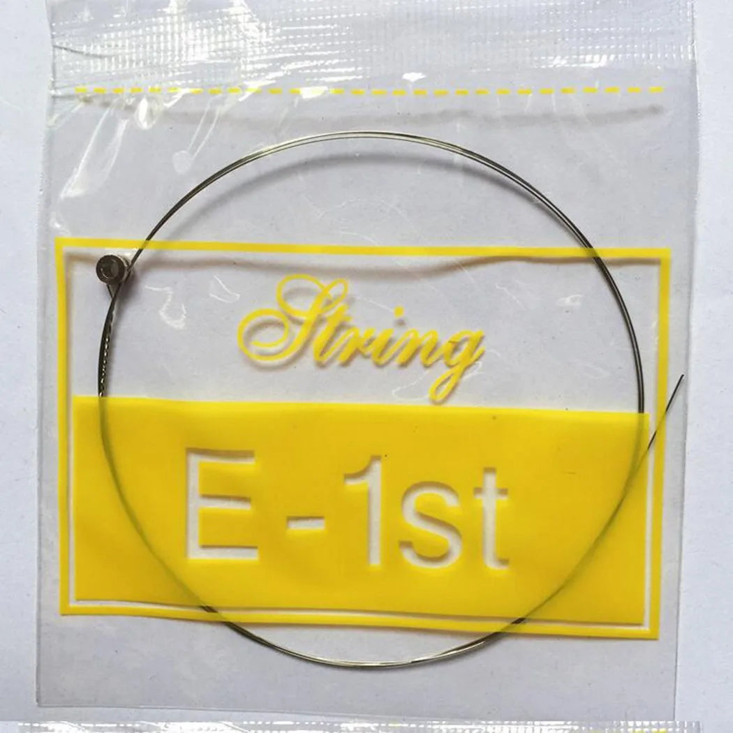 A thin metallic e 1st single guitar string in clear plastic bag with yellow label for guitar strings acoustic replacement musical instrument