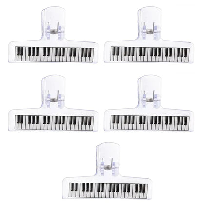 Clear plastic sheet music clip with piano pattern strong grip design for acrylic music stand and organizer use