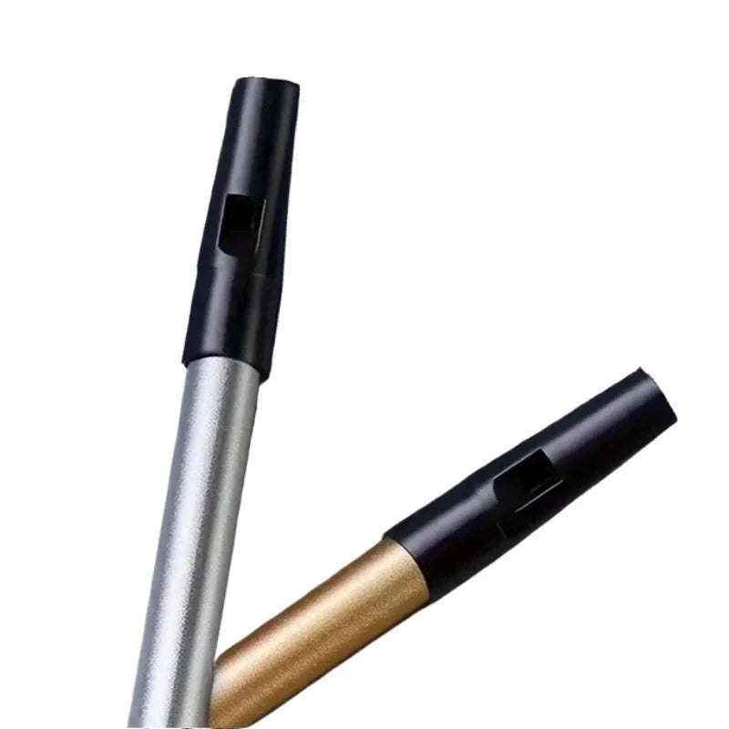 Two sleek metal tin penny whistles in silver and gold with black mouthpieces key irish whistle ideal for beginners