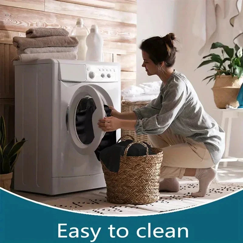 White front-loading washing machine with circular door shown beside a light thin fabric piano cover dust cover for keyboards