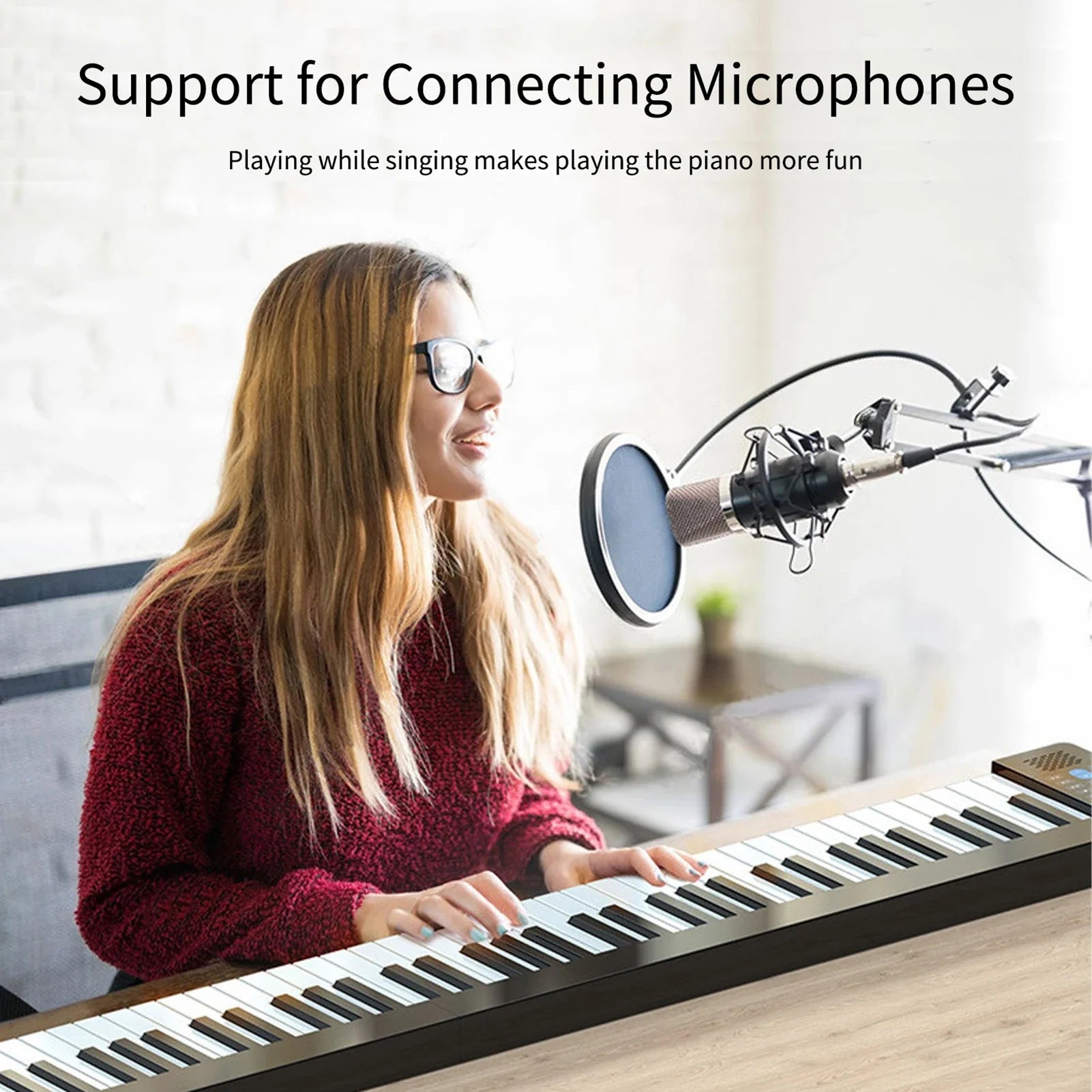 Black and white 61-key foldable electronic piano with multifunctional electronic organ features rechargeable bt connectivity and microphone stand