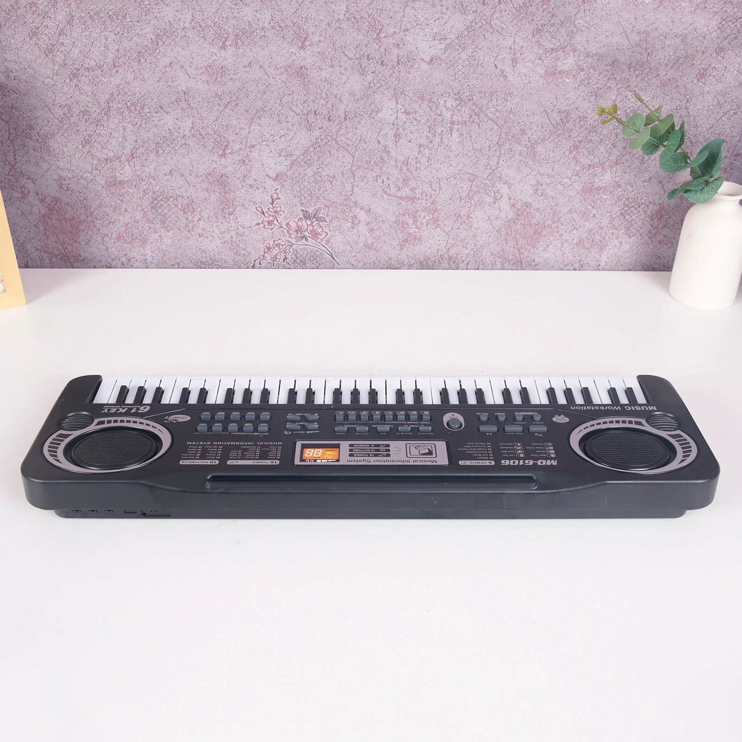Black 61 keys electric piano kids keyboard with white and black keys and small orange digital display gift musical instrument