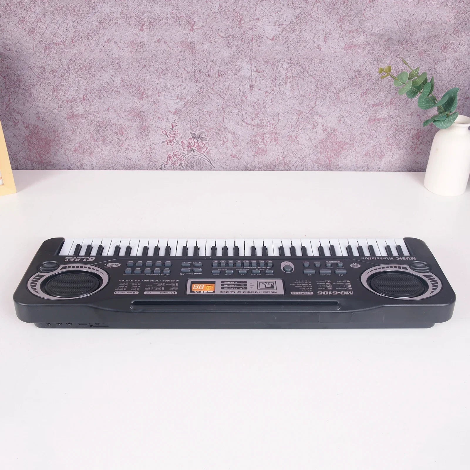 Black 61 keys electric piano kids keyboard with white and black keys and small orange digital display gift musical instrument
