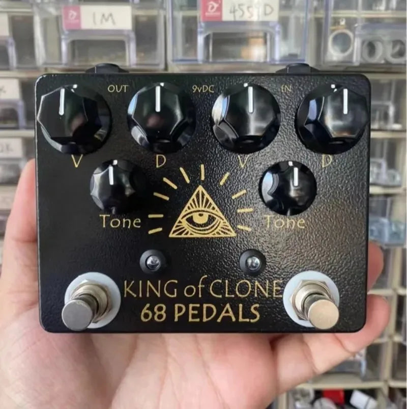 Black 68pedals king of tone high gain effects pedal with gold lettering six knobs and two footswitches for overdrive