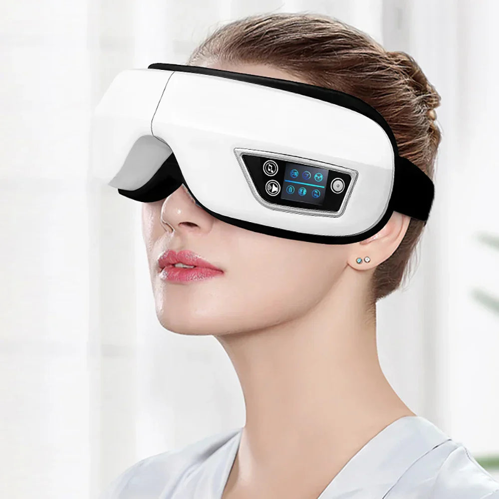 White and black 6d smart bluetooth music eye massager with digital display panel featuring vibration airbag and compress eye care