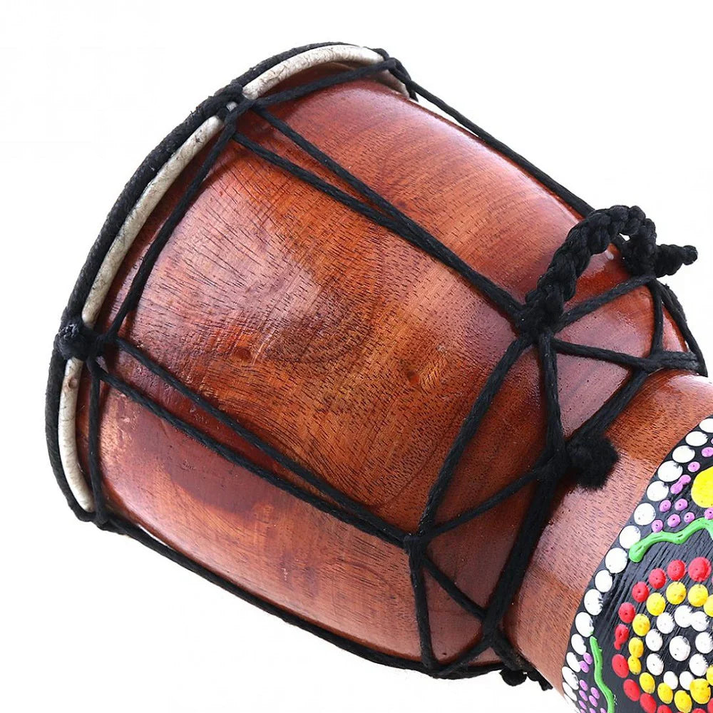 Handcrafted 6in african drum with solid wood, goat skin, black rope tension, and colorful dot patterns on rim for promotional offer