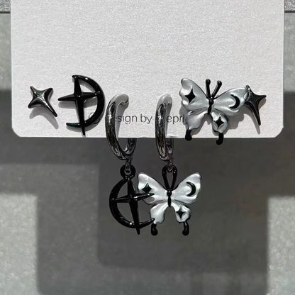 Black and silver celestial hoop earrings with butterfly moon star crescent designs from rock y2k jewelry set
