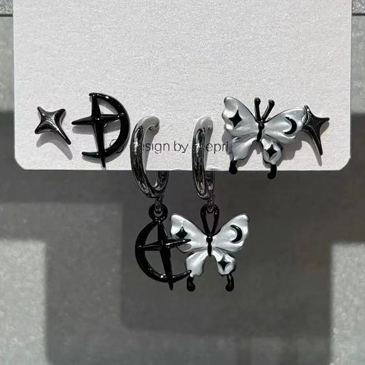 Black and silver celestial hoop earrings with butterfly moon star crescent designs from rock y2k jewelry set