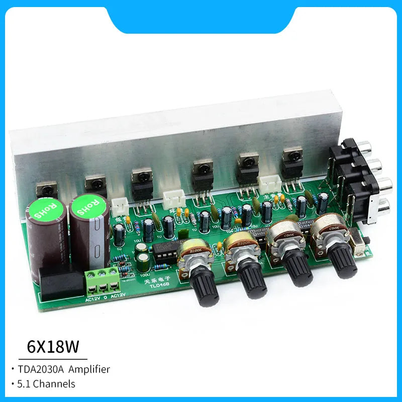 Green printed circuit board amplifier with tda2030a chips black knobs and silver heat sink for subwoofer power amplifiers