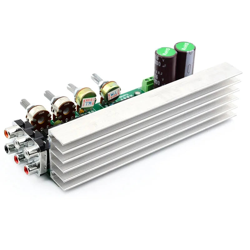 Silver aluminum heatsink on a green circuit board with knobs and capacitors in 6x18w channels power amplifiers