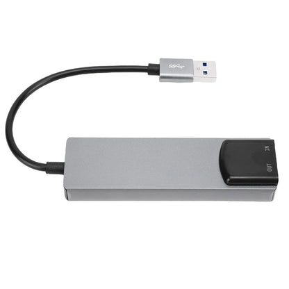 Silver usb 3.0 external sound card with spdif digital sound and usb surround sound ports labeled for input and output