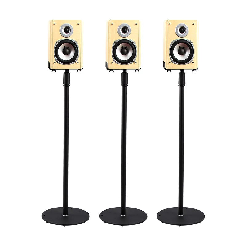 Three cream-colored wooden bookshelf speakers on black metal adjustable speaker stands for surround frame home theater use