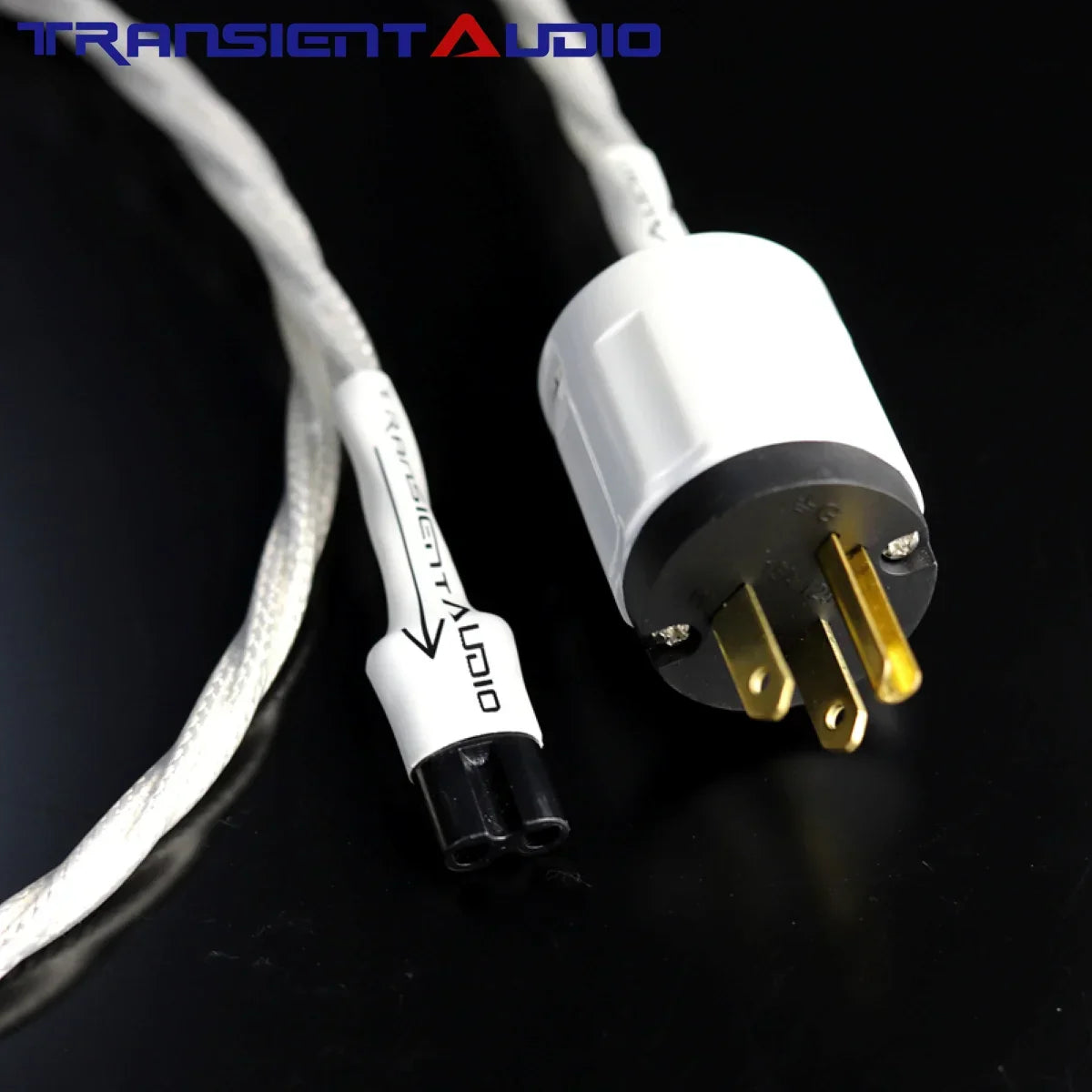 White braided 7NOCC audiophile-grade power cord with gold-plated prongs and mini8-shaped tail connector