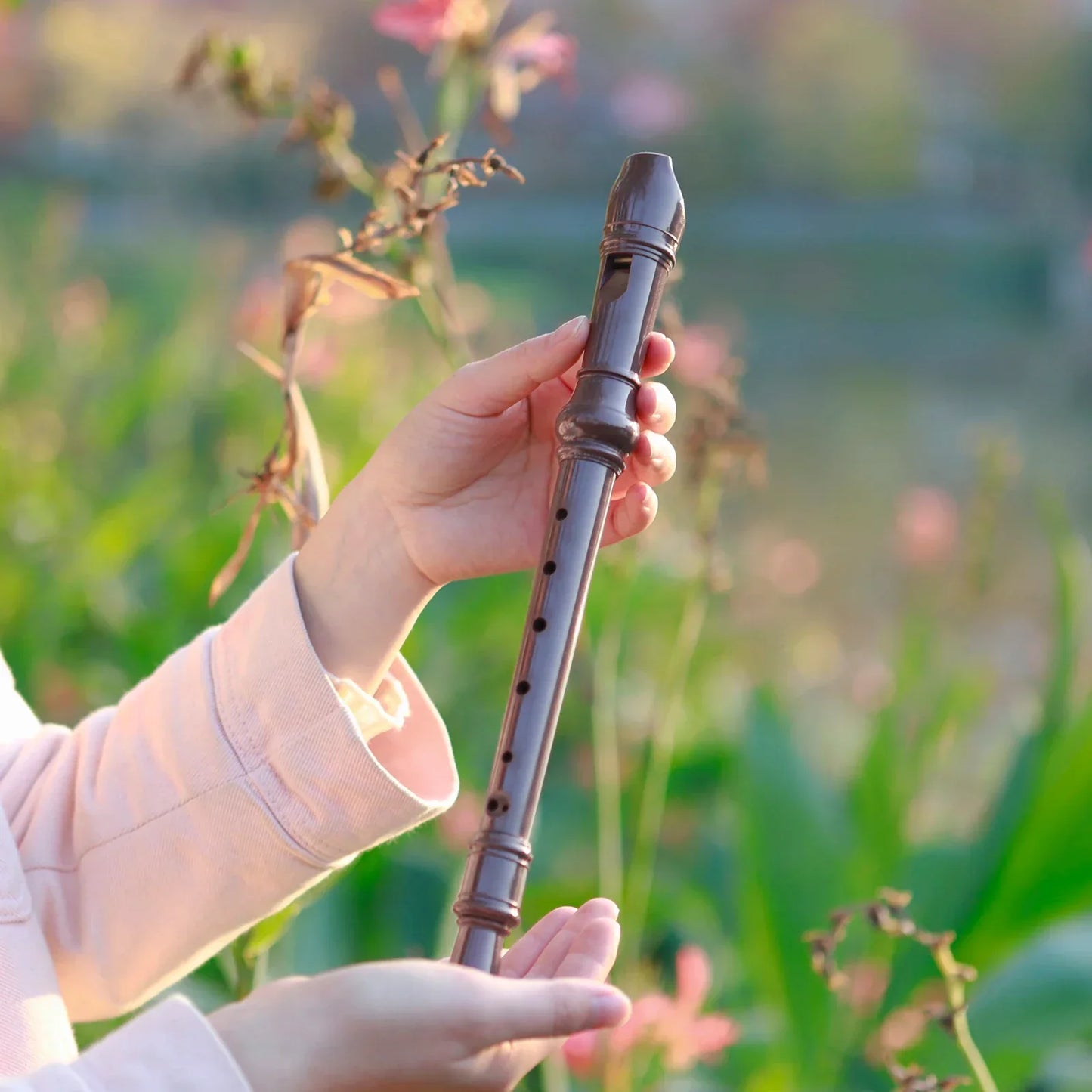 Dark brown wooden vertical flute musical instrument with 8 holes and decorative rings for beginners and children