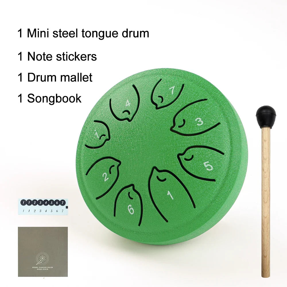 Green mini steel tongue drum with black numbered note stickers and wooden mallet ideal musical toy instrument for beginners
