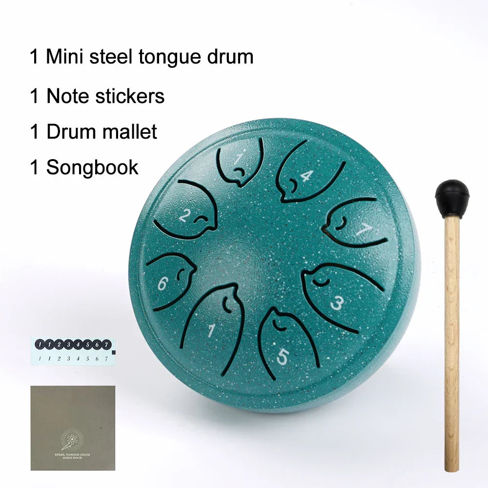 Teal glitter-finish steel tongue drum with numbered fish-shaped tone holes 8 notes ethereal drum musical toy instrument