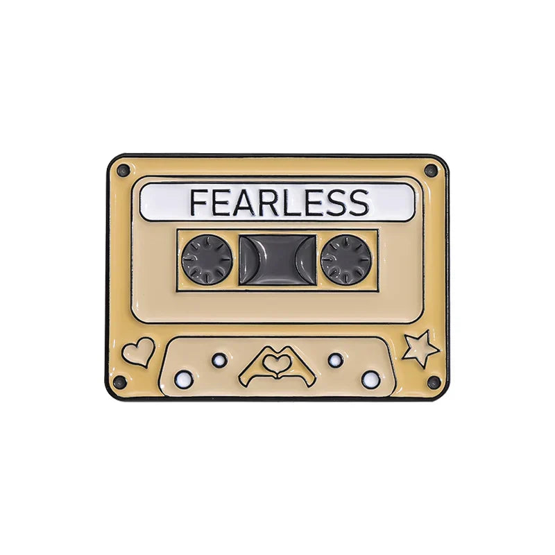 Beige enamel pins vintage cassette tape pin with fearless text and heart design from 90s retro music collection