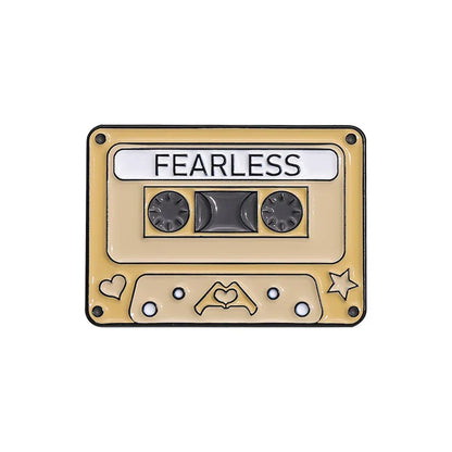 Beige enamel pins vintage cassette tape pin with fearless text and heart design from 90s retro music collection
