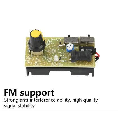 Green circuit board with black and yellow knob and blue capacitor for two bands stereo wave frequency modulation digital tuning headphone kit