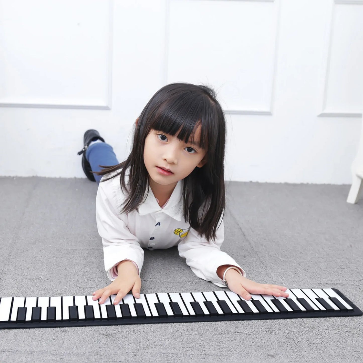 Black and white keys foldable portable rechargeable electronic piano with usb wireless connectivity and flexible design