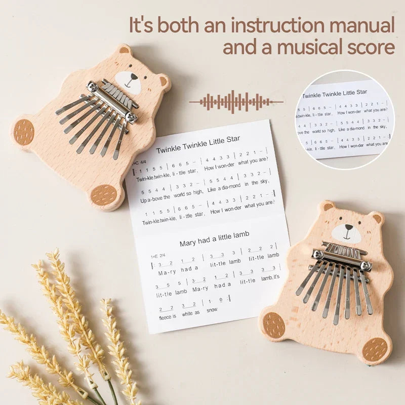 Light-colored wooden bear thumb piano with metal keys portable marimba musical baby montessori toys gift
