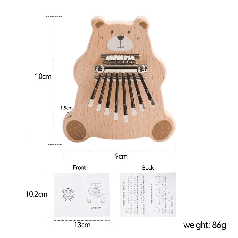 A light wood bear thumb piano kalimba with silver metal keys and white caps perfect as baby montessori toys portable marimba musical gift