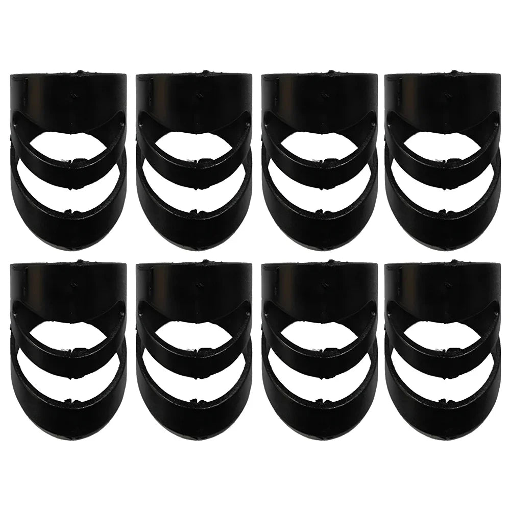Black plastic garden plant pot risers with curved three-arched design alongside alaska picks plectrums guitar finger covers