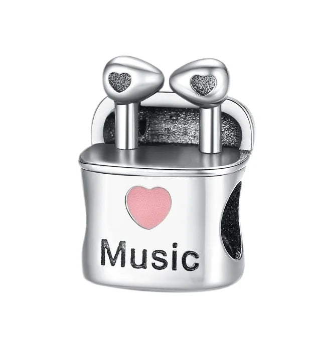 Silver music charms shaped like an open earbud case with a pink heart and music engraving for original bangle bracelet