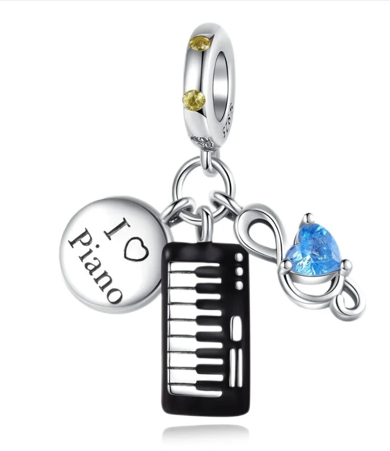 Silver music charm in sterling silver with piano keys black design heart-shaped blue gemstone and i heart piano engraved disc for original bangle bracelet
