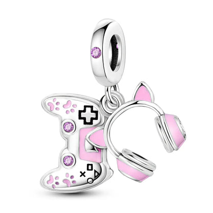 925 sterling silver music charm featuring pink and silver game controller and headphones with purple gemstones for original bangle bracelet