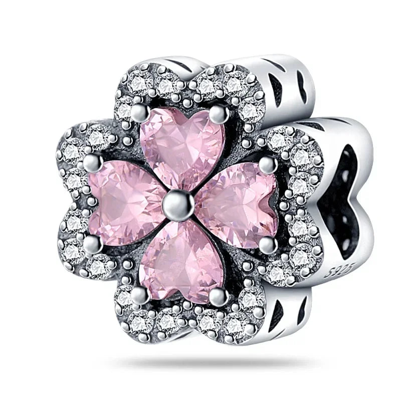 A delicate 925 sterling silver music charm with pink heart stones and clear crystals for original bangle bracelet
