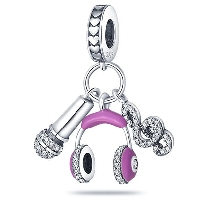 Sterling silver music charms featuring a silver microphone headphones and music note with pink enamel for original bangle bracelet