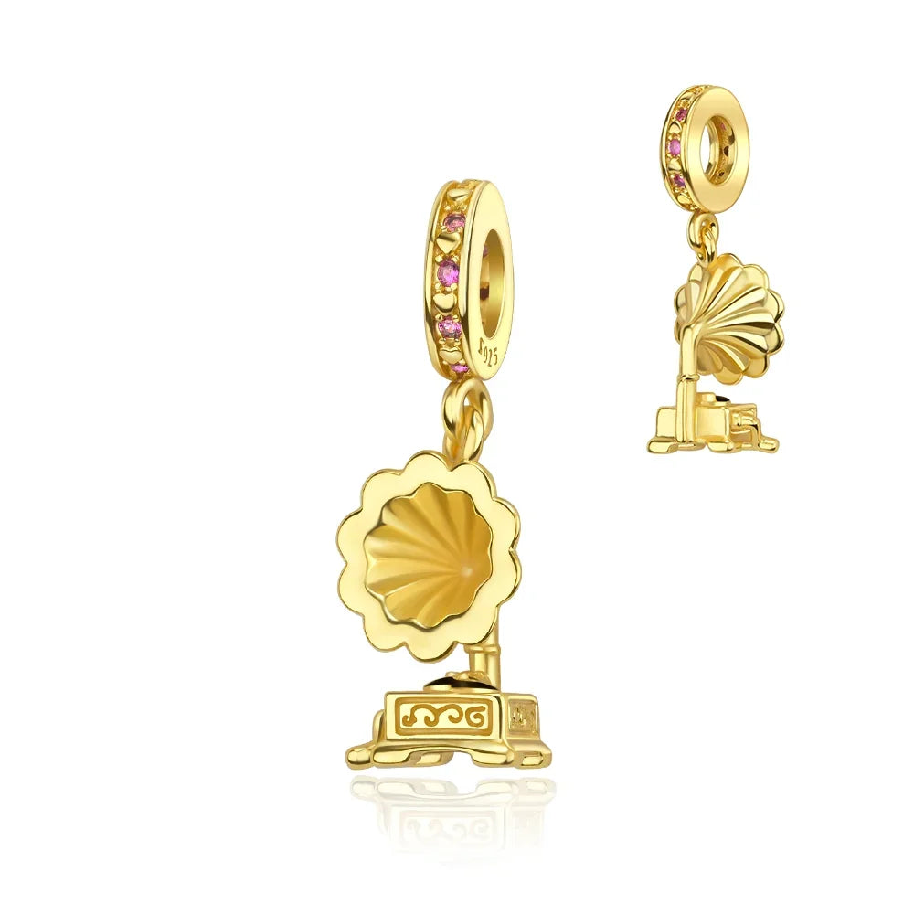 Gold-colored gramophone charm with pink gemstone accents in sterling silver musical instrument charms collection