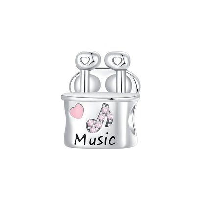 Sterling silver musical instrument charm featuring sparkling note design pink enamel heart and engraved music text