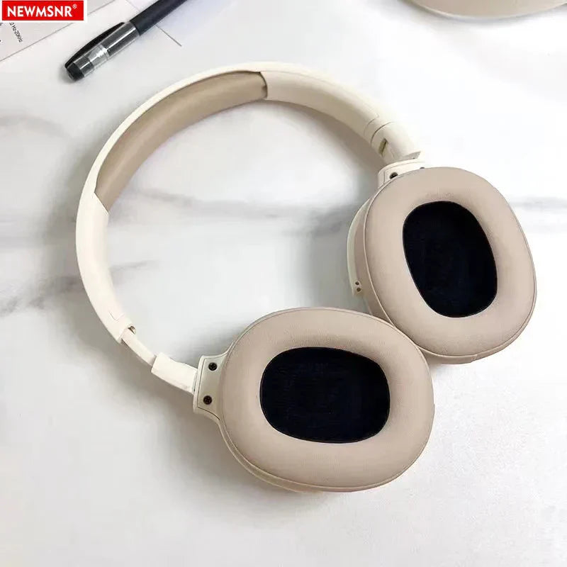 Beige over-ear wireless bluetooth headphones with soft padded earcups and headphones deep bass for surround sound wireless use