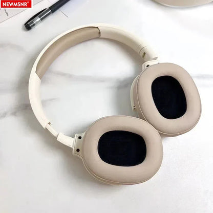 Beige over-ear wireless bluetooth headphones with soft padded earcups and headphones deep bass for surround sound wireless use