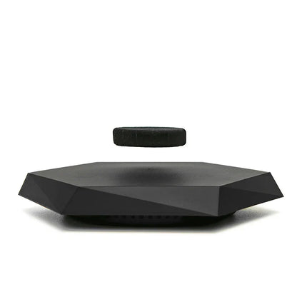 Black floating magnetic suspension display with sleek geometric base and rotating function for collectibles jewelry hand-made doll display