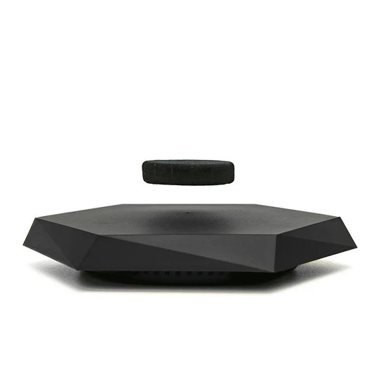 Black floating magnetic suspension display with sleek geometric base and rotating function for collectibles jewelry hand-made doll display